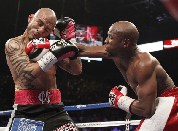 Floyd Mayweather Miguel Cotto - AP Photo